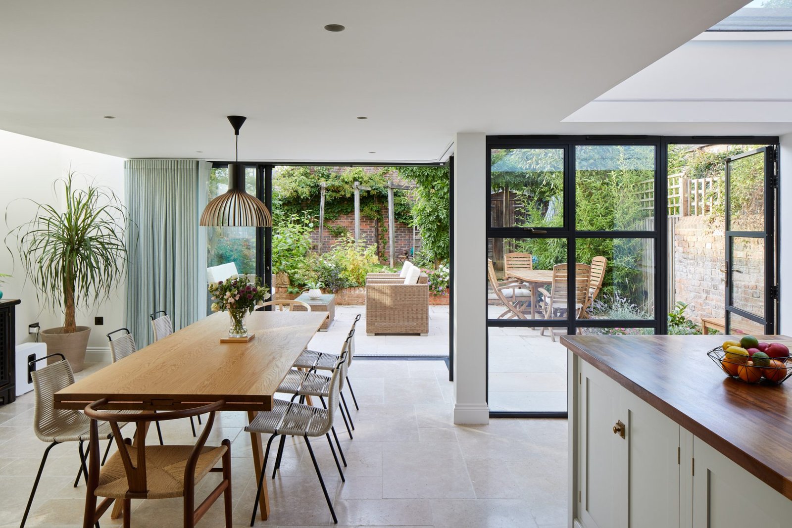 Bright open kitchen and dining extension looking onto the garden